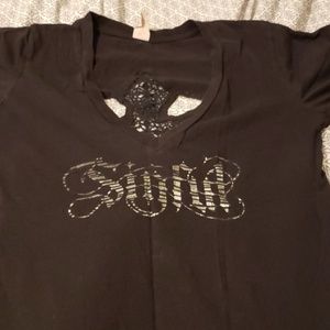 Black Sinful shirt with Cross on the back.